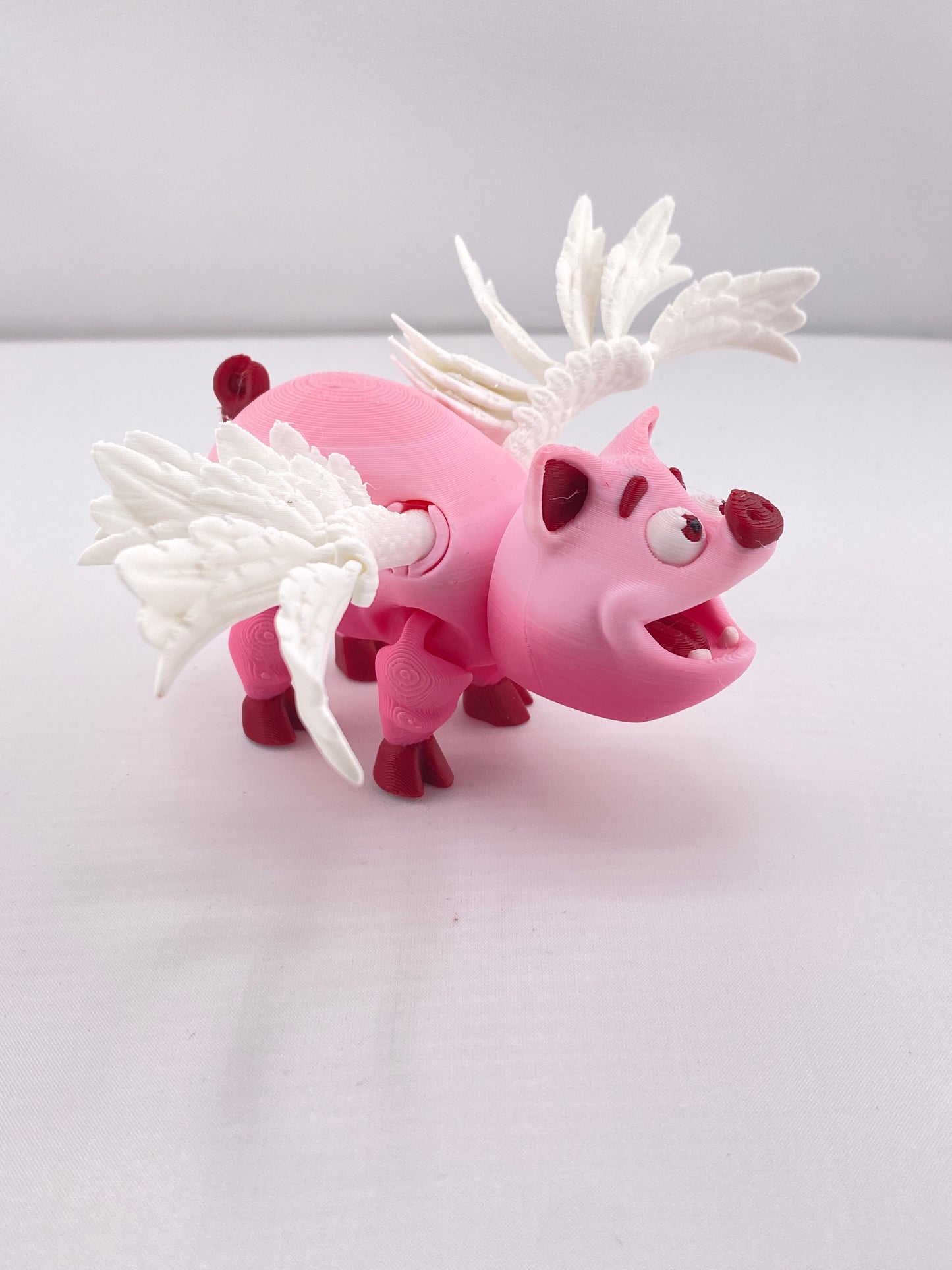 Articulated Flying Pig Figurine