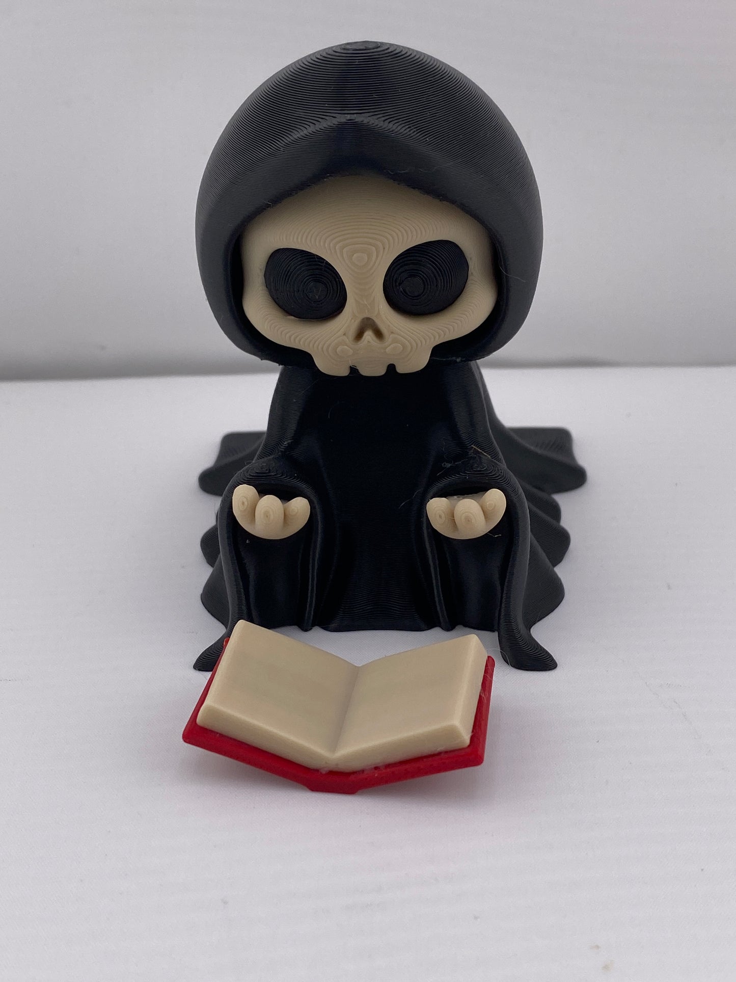 Grim Reaper Reading A Book Halloween Figurine