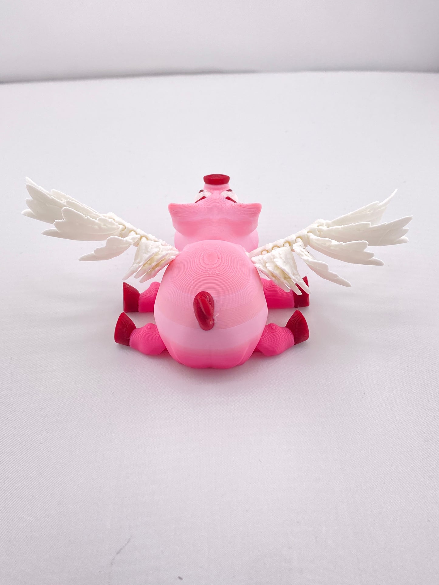 Articulated Flying Pig Figurine