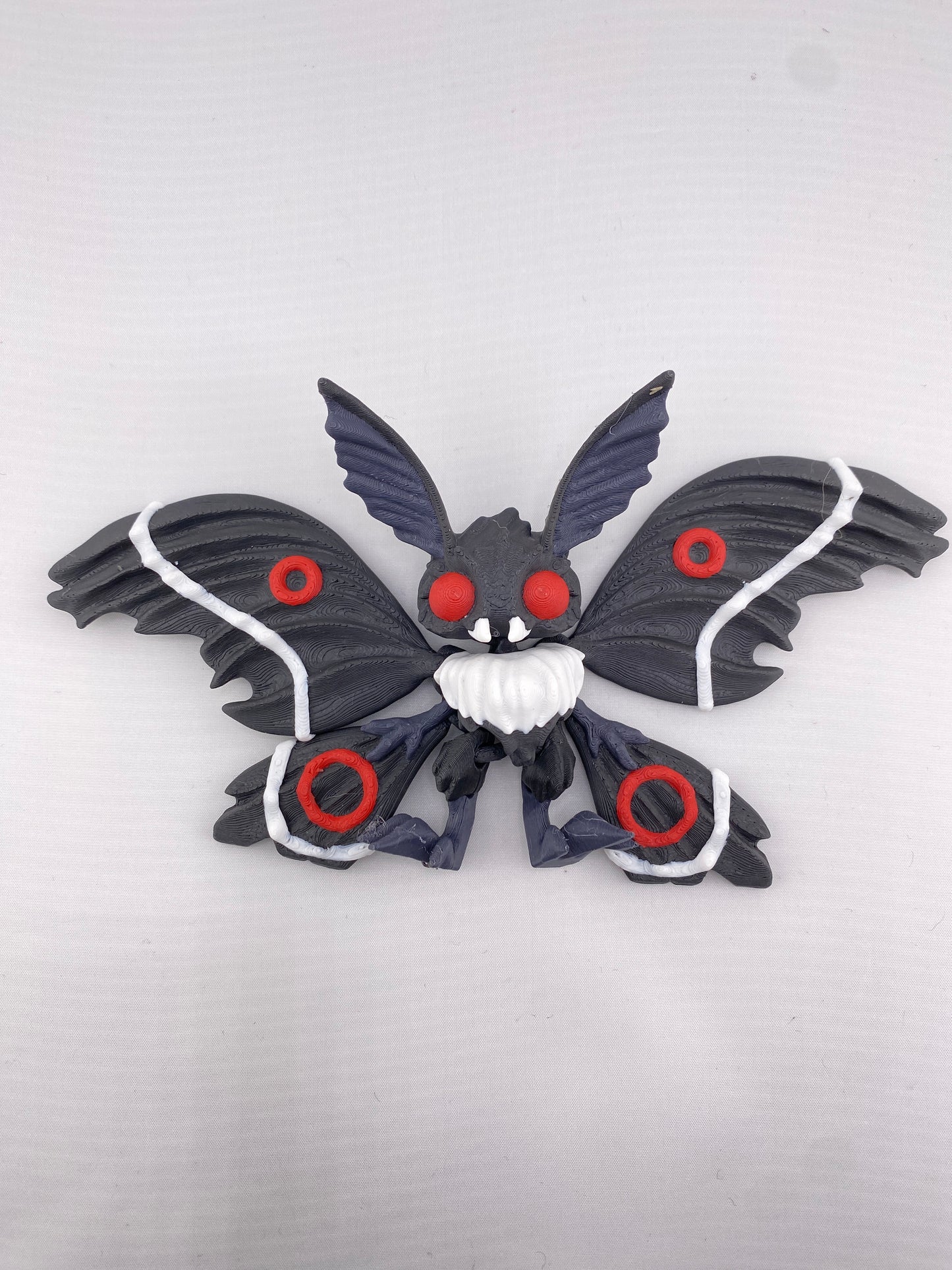 Twisty Moth Man Articulating Figurine